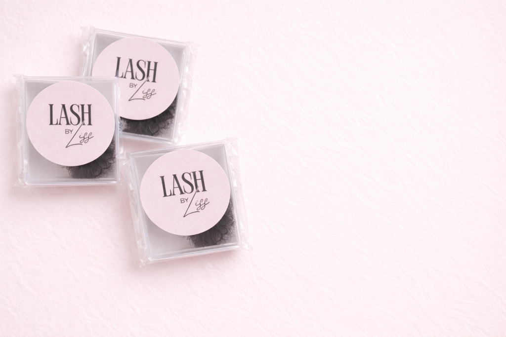 Three small containers labeled 'LASH' on a light pink background. Each container contains quality false eye lashes.